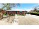 Charming brick home with a well-maintained front yard and sidewalk, offering a welcoming curb appeal at 7620 Hooker St, Westminster, CO 80030