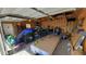 Organized garage space with storage solutions, tools, and equipment, showing functionality and ample room at 7620 Hooker St, Westminster, CO 80030