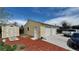 Spacious two-car garage and shed with new doors, concrete driveway, and yard with wood mulch at 7620 Hooker St, Westminster, CO 80030