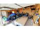 Spacious garage with ample storage and workbench area, suitable for projects and parking vehicles at 7620 Hooker St, Westminster, CO 80030