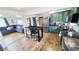 Open kitchen and living area featuring stainless steel appliances, countertops, and inviting atmosphere at 7620 Hooker St, Westminster, CO 80030