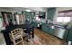 Updated kitchen with stainless steel appliances and custom cabinetry at 7620 Hooker St, Westminster, CO 80030