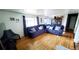Cozy living room featuring hardwood floors, natural light, and a welcoming atmosphere at 7620 Hooker St, Westminster, CO 80030