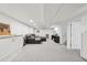 Spacious finished basement with neutral carpet, recessed lighting, and comfortable seating area at 3285 N Monaco Pkwy, Denver, CO 80207