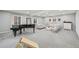 Large finished basement with open layout and modern finishes at 3285 N Monaco Pkwy, Denver, CO 80207