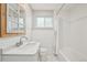Bathroom with subway tiles, marble floors, and a shower and bath combo at 3285 N Monaco Pkwy, Denver, CO 80207