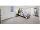 Finished basement bedroom with neutral carpet, egress window, and closet at 3285 N Monaco Pkwy, Denver, CO 80207