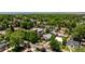 Enjoy the stunning aerial view of this vibrant neighborhood with lush green trees and well-maintained homes at 3743 N Yates St, Denver, CO 80212