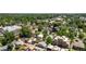 Aerial view of a neighborhood showcasing tree-lined streets and a mix of residential homes at 3743 N Yates St, Denver, CO 80212