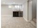 Basement area complete with a wet bar, carpet and good lighting for a modern touch at 3743 N Yates St, Denver, CO 80212