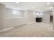 Large basement area with recessed lighting, windows and a wet bar offering lots of flexible living space at 3743 N Yates St, Denver, CO 80212