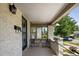 Cozy front porch with seating, offering a relaxing space with neighborhood views at 3743 N Yates St, Denver, CO 80212