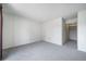 Spacious bedroom featuring plush carpeting and large closet at 6380 Oak St # 107, Arvada, CO 80004