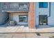 A cozy patio with a view of the building's exterior at 6380 Oak St # 107, Arvada, CO 80004