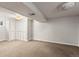 Spacious basement with carpet and multiple closets, offering ample storage and living space at 10862 Albion Dr, Thornton, CO 80233