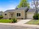 Charming one-story home with a well-manicured lawn, inviting curb appeal, and attached single-car garage at 10862 Albion Dr, Thornton, CO 80233