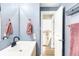Stylish bathroom with modern vanity, mirror, and soft lighting offers a relaxing and functional space at 12175 Birch St, Thornton, CO 80241