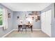 Bedroom with light blue walls, desk, storage, and a bright window creates a versatile space at 12175 Birch St, Thornton, CO 80241