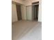 Minimalist bedroom with ample carpet space and closet at 891 14Th Street # 1712, Denver, CO 80202