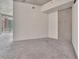 Spacious bedroom with plush carpeting, modern lighting, and ample natural light at 891 14Th Street # 1712, Denver, CO 80202