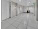 A well-lit elevator lobby with modern tile floors and multiple elevator access points at 891 14Th Street # 1712, Denver, CO 80202
