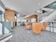 A stylish lobby with modern furnishings and architectural details, featuring a staircase at 891 14Th Street # 1712, Denver, CO 80202