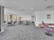 Spacious lounge area with seating and a kitchenette for residents at 891 14Th Street # 1712, Denver, CO 80202