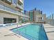 Relax by the rooftop pool with city views, sun loungers and refreshing blue tile at 891 14Th Street # 1712, Denver, CO 80202