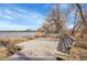 Features a dock and seating area on a beautiful community lake at 13649 Plaster Cir, Broomfield, CO 80023