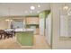 Kitchen with an island, modern lighting, and a dining area at 13649 Plaster Cir, Broomfield, CO 80023
