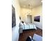 Relaxing bedroom features cozy decor and modern lighting fixture at 1000 E 1St Ave # 405, Denver, CO 80218