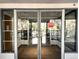 Entryway with dual glass doors leading to the outdoors at 1000 E 1St Ave # 405, Denver, CO 80218