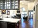 Cozy living room featuring a fireplace, large window, and open floor plan for easy entertaining at 1000 E 1St Ave # 405, Denver, CO 80218