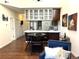 Open-concept living area with modern kitchen, dining space, and cozy seating, perfect for relaxation at 1000 E 1St Ave # 405, Denver, CO 80218