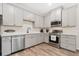 Well-designed kitchen features quartz countertops, stainless steel appliances, and a modern aesthetic at 5745 S Buchanan Ct # C, Aurora, CO 80016