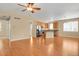 Open-concept kitchen with stainless steel appliances and a center island at 8260 E 24Th Dr, Denver, CO 80238