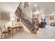 Basement stairs with ornate railing leading to finished basement at 5960 S Watson Ln, Littleton, CO 80123