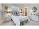 Cozy bedroom with a queen-size bed and built-in shelving at 5960 S Watson Ln, Littleton, CO 80123