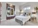 Charming bedroom with a queen-size bed and a window seat at 5960 S Watson Ln, Littleton, CO 80123