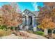 Luxury home with stone accents and landscaping, offering curb appeal at 5960 S Watson Ln, Littleton, CO 80123