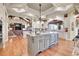 Bright kitchen boasts an expansive island and top-of-the-line appliances at 5960 S Watson Ln, Littleton, CO 80123
