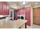 Spacious laundry room with ample storage, washer, and dryer at 5960 S Watson Ln, Littleton, CO 80123