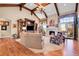 Spacious living room with hardwood floors, fireplace, and high ceilings at 5960 S Watson Ln, Littleton, CO 80123