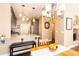 Bright dining area with hardwood floors and chandelier, adjacent to kitchen at 12711 Colorado Blvd # 912, Thornton, CO 80241