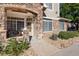 Charming front entrance featuring a stone archway and a cozy seating area at 12711 Colorado Blvd # 912, Thornton, CO 80241