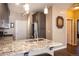 Modern kitchen with granite countertops and stainless steel appliances at 12711 Colorado Blvd # 912, Thornton, CO 80241