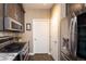 Modern kitchen with granite countertops and stainless steel appliances at 12711 Colorado Blvd # 912, Thornton, CO 80241