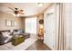 Bright and airy living room with hardwood floors and a comfy couch at 12711 Colorado Blvd # 912, Thornton, CO 80241