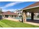 Community pool covered for the off-season, set amongst manicured green spaces at 12711 Colorado Blvd # 912, Thornton, CO 80241