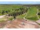 Beautiful aerial perspective showing a mix of open meadows, winding paths, clusters of trees, and equestrian facilities at 2470 Driftwood, Elizabeth, CO 80107